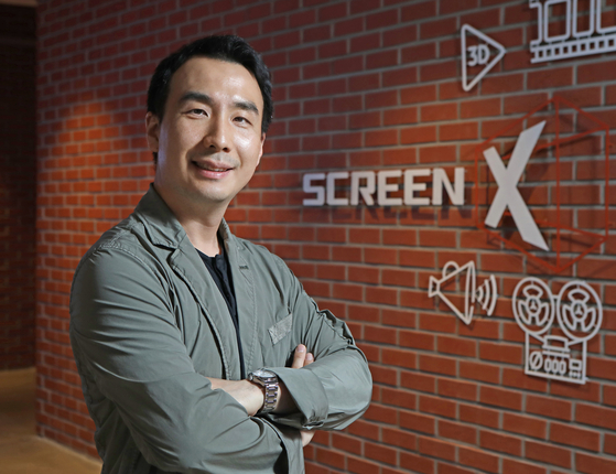 ScreenX prodcuer at CGV Oh Yoon-dong poses for a photo at the CGV Yongsan office in central Seoul on March 16. [PARK SANG-MOON]
