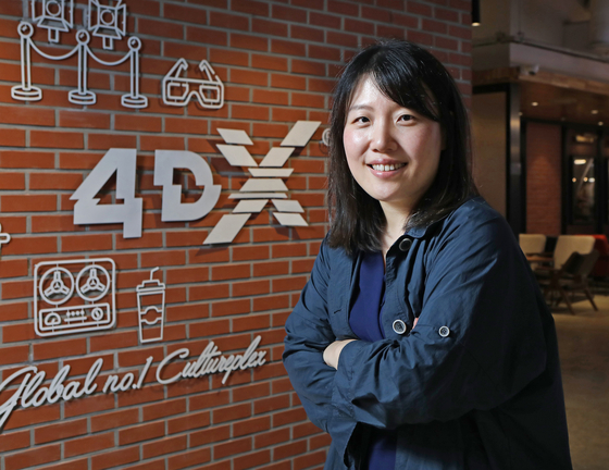 4DX producer at CGV Lee Ji-hye poses for a photo at the CGV Yongsan in central Seoul on March 16. [PARK SANG-MOON]
