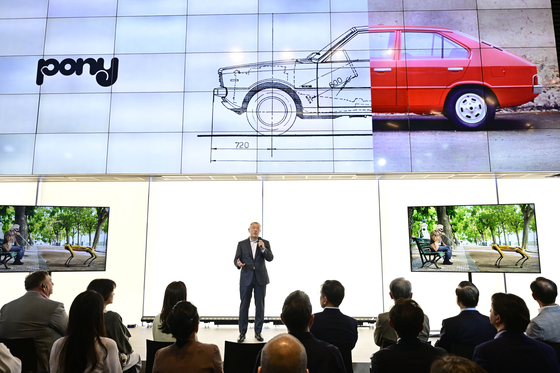 Hyundai Motor Group Executive Chair Euisun Chung speaks during an opening ceremony of the “Pony, the timeless” exhibition in southern Seoul on Wednesday. [HYUNDAI MOTOR]