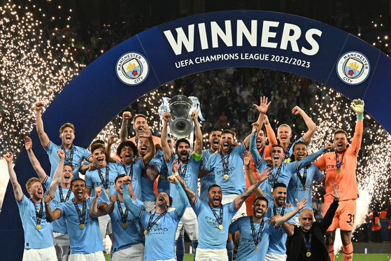 Manchester City secure first Champions League title to win treble