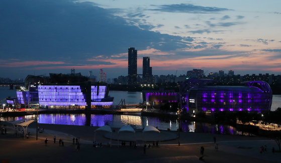 The Some Sevit, or the Sevit islets in Banpo Han River Park, is lit in purple on June 12, as part of the ″2023 BTS Festa″ held in celebration of K-pop boy band BTS's 10th anniversary of debut. [NEWS1]