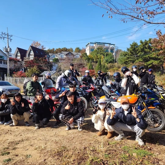 A group picture of Sejong Riders during their yearly retreat to celebrate the start of their seasonal tour [SCREEN CAPTURE]