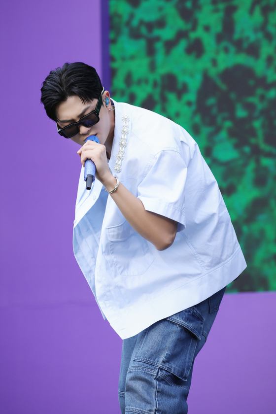 BTS's RM performs his solo songs during the ″2023 BTS Festa″ event held on Saturday at the Yeouido Han River Park in western Seoul. [HYBE]