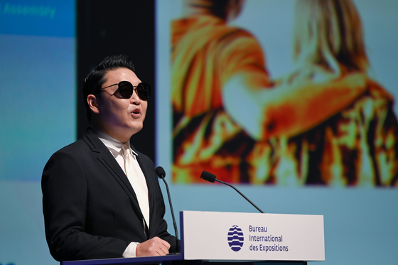 Korean singer Psy, or Park Jai-sang, speaks at a presentation promoting Busan’s 2030 World Expo bid at the 172nd general assembly of the Bureau International des Expositions in Issy-les-Moulineaux, near Paris, Tuesday. [NEWS1] 