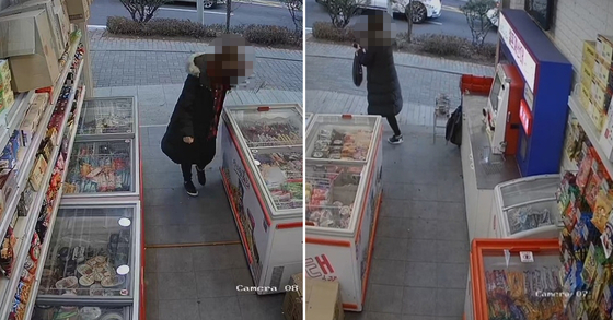 A person takes unpaid ice cream products from an unmanned ice cream store in Daejeon in 2022. [DAEJEON METROPOLITAN POLICE AGENCY]