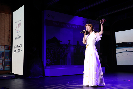 Gugak (Korean classical music) singer Ha Yun-ju peforms the theme song for the Baekje Historic Areas, as part of the 2023 World Heritage Festival, during a press conference in central Seoul on Wednesday. [CULTURAL HERITAGE ADMINISTRATION]