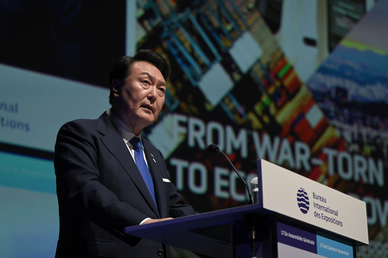 President Yoon Suk Yeol delivers a speech to promote Busan's 2030 World Expo bid to host the World Expo 2030 at the 172nd general assembly of the Bureau International des Expositions in Issy-les-Moulineaux, near Paris, Tuesday. [JOINT PRESS CORPS]