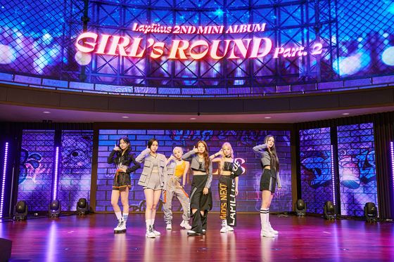 Girl group Lapillus poses for a photo during a showcase on Wednesday at the Sky Art Hall in Gangseo District, western Seoul. [MLD ENTERTAINMENT]
