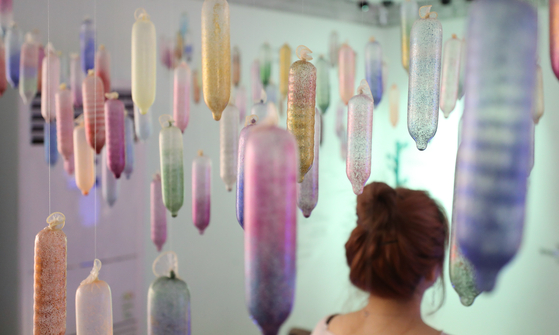 This photo shows installations made from condoms at a condom exhibition in Seocho District, southern Seoul, in 2020. [YONHAP]