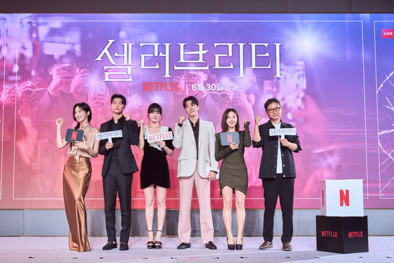 From left, actors Lee Chung-ah, Kang Min-hyuk, Park Gyu-young, Lee Dong-gun, Jun Hyo-seong and director Kim Cheol-kyu pose for a photo during a press conference for new Netflix series ″Celebrity″ at Hotel Naru Seoul MGallery Ambassador in Mapo District, western Seoul, on Monday. [NETFLIX]