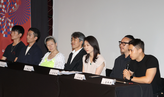 From left, dance crew Mover director Kim Seol-jin, Mover choreographer Kim Ki-su, contemporary dance performer and choreographer Ahn Eun-me, playwright Bae Sam-sik, KBS Symphony Orchestra art director Son Yu-ri, new media artist Lee Jin-joon and artist Kim Hee-cheon speak during the press conference for 2023 Korea Season, in Jongno District, central Seoul, on Thursday. [YONHAP][YONHAP]