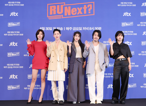 Choi Soo-young, presenter, and four coaches, Jo Kwon, Park Gyu-ri, Lee Hyun and Aiki pose for the camera at the press showcase for JTBC, HYBE and Belift Lab's upcoming girl group audition program ″R U Next?″ in Mapo District, western Seoul on Friday [JTBC]