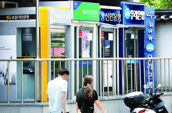 Booths for automated teller machines of major commercial banks are seen in Seoul. [NEWS1]