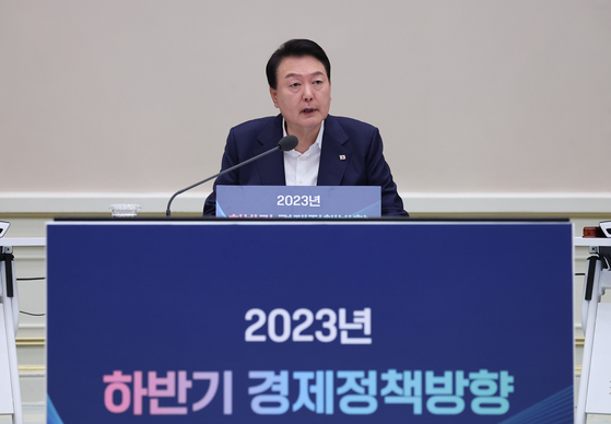 President Yoon Suk Yeol speaks during an economic policy meeting held in central Seoul on Tuesday. [YONHAP]