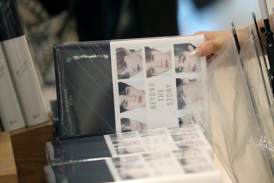 BTS's book ″Beyond the Story″ on sale at a Kyobo Bookstore Gwanghwamun branch in central Seoul on Sunday. [NEWS1]