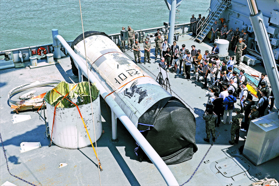 The salvaged parts of North Korea's failed spy satellite are displayed to the press at the Second Fleet of the South Korean Korean Navy on June 16. [YONHAP]