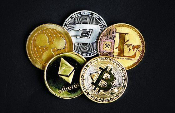 Physical imitations of cryptocurrency [YONHAP/AFP]