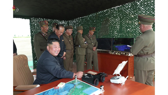 Kim Jong-un’s iPad on a desk where he was overseeing the testing of large-size multiple rocket launchers in August 2019. [KOREAN CENTRAL NEWS AGENCY]