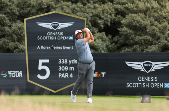 An Byeong-hun tees off on the 5th hole during Day One of the Genesis Scottish Open at The Renaissance Club in North Berwick, Scotland on Thursday.  [GETTY IMAGES]