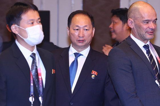 North Korea’s ambassador to Indonesia and the Asean region, An Kwang-il, center, attends the Asean Regional Forum in Jakarta, Indonesia, on Friday. [YONHAP] 