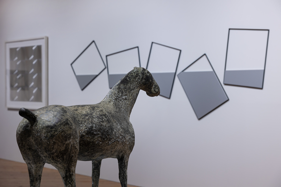 Marino Marini’s horse statue “Cavallo” (1945) in front of Getulio Alviani’s aluminium piece “Superficie a testura vibratile” (1965), left, and Grazia Varisco’s “Quadri comunicanti” (2008) [ART SONJE CENTER]