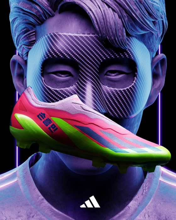 A promotional poster for limited-edition Adidas football boots shows the green and red boots over an image of Tottenham Hotspur midfielder Son Heung-min. The boots, which have “Son Heung-min” written on them in Korean, were released to mark 15 years since the Korean footballer first moved to Germany to join the Hamburger SV academy. [YONHAP]