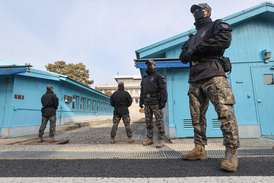 South Korean soldiers assigned to the United Nations Command stand guard at the truce village of Panmunjom inside the Joint Security Area (JSA) in Paju, Gyeonggi, on Feb. 7. [YONHAP]