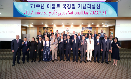 Ambassador of Egypt to Korea Khaled Abdel Rahman, seventh from front left, and members of the diplomatic corps in Seoul celebrate the 71st anniversary of the Egyptian Revolution of 1952 at the Army Club in central Seoul on Friday. [EMBASSY OF EGYPT IN KOREA]