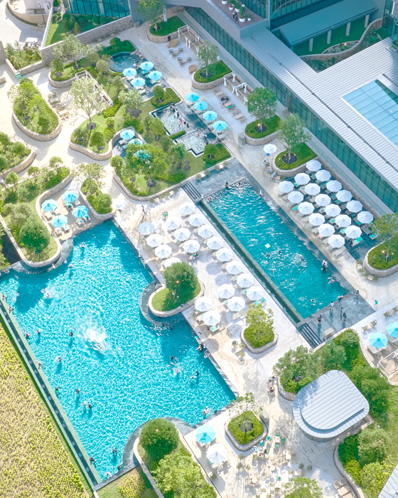 An aerial view of an outdoor swimming pool at Village de Ananti in Gijang County, Busan, which opened on July 18. [VILLAGE DE ANANTI] 
