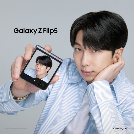 RM of BTS holds up Samsung Electronics' Z Flip 5, promoting its selfie function. [SAMSUNG MOBILE TWITTER ACCOUNT]