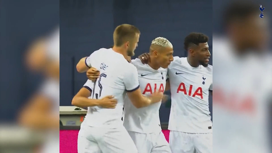 Tottenham Hotspur's Richarlison, center, celebrates scoring a goal against Lion City Sailors with his teammates. [ONE FOOTBALL]  