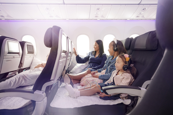 Air New Zealand's Skycouch transforms three Economy seats into a couch. [AIR NEW ZEALAND] 