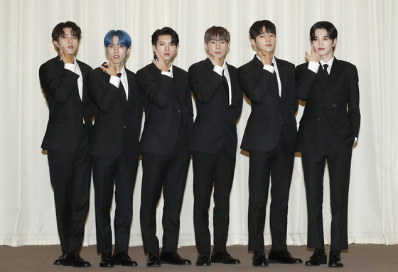Boy band Infinite poses for photos during a press conference held on Monday at The Riverside Hotel in southern Seoul in celebration of its new album, ″13egin.″ [NEWS1]