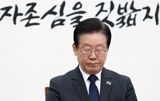 Democratic Party leader Lee Jae-myung during a party meeting at the National Assembly in western Seoul in on March 22. [NEWS1] 