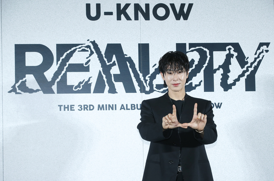 U-Know Yunho of boy band TVXQ poses for photos during a press conference held Monday at Megabox COEX branch in southern Seoul for his latest EP "Reality Show." [NEWS1]