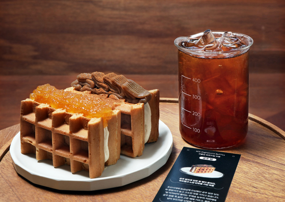 Waffles made with Korean-grown wheat and iced Americano made with heirloom grains [PARK SANG-MOON]