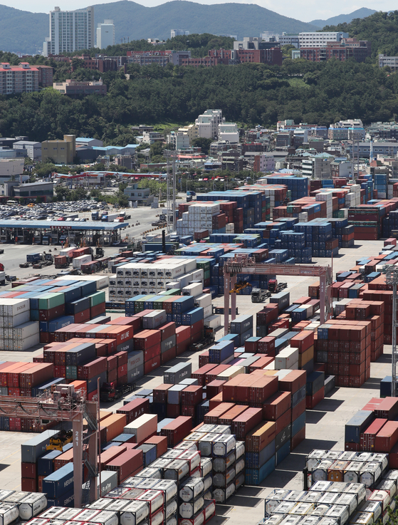 Containers stacked up at a port in Busan on Aug. 1. [NEWS1]