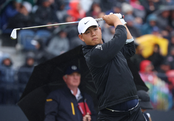 Tom Kim tees off on the 4th hole during the final round of The Open at Royal Liverpool in Liverpool on July 23.  [REUTERS/YONHAP]