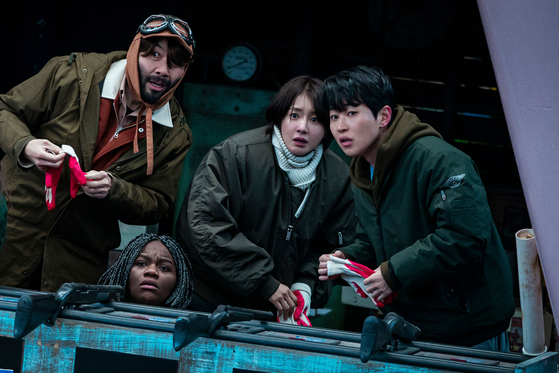 In ″Zombieverse,″ 10 cast members have to escape a zombie-ridden Seoul and get to a remote island to survive [NETFLIX]