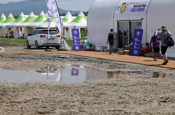 Puddles of water are visible across the Jamboree campsite in Saemangeum, North Jeolla, after a heavy rainfall on July 18, a fortnight before the event. [YONHAP]