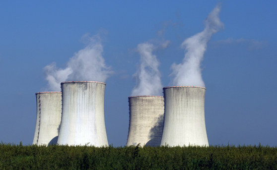 Four cooling towers are running at the Dukovany nuclear power plant in the Czech Republic. [AP] 