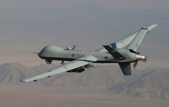  MQ-9 Reaper, armed with GBU-12 Paveway II laser guided munitions and AGM-114 Hellfire missiles. [AP/YONHAP]