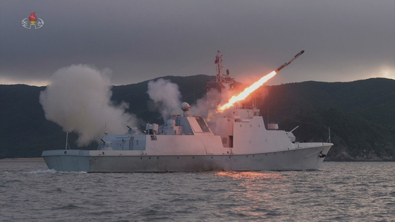 In this footage released by Pyongyang's state-controlled Korean Central Television, a cruise missile is launched from a newly commissioned Amnok-class naval frigate. [YONHAP]