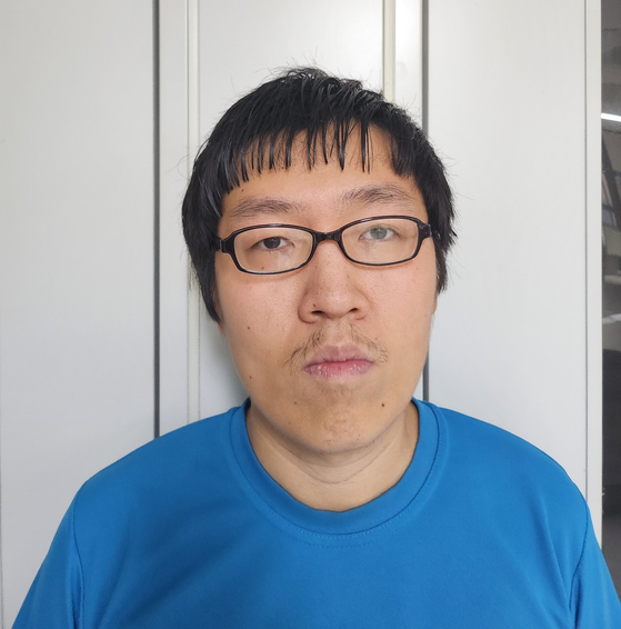 The mugshot of Choi Yoon-jong, 30, accused of raping and murdering a woman on a hiking trail in Sillim-dong, southern Seoul, was revealed by the police on Wednesday. [SEOUL METROPOLITAN POLICE AGENCY]