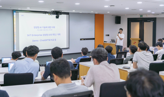 Employees of SK Telecom listen to a lecture about the mobile carrier's business strategy utilizing multiple large language models on Wednesday. [SKT]