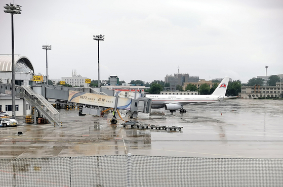 A plane registered under North Korean flag carrier Air Koryo rests on the tarmac at Beijing Capital International Airport on Thursday. [YONHAP]