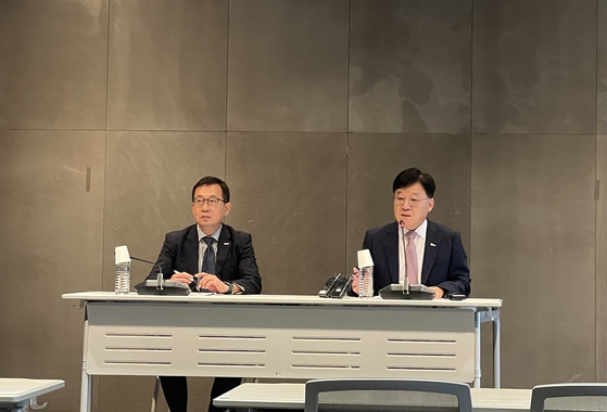 From left, Cho Sang-hyeon, the head of KITA's Institute for International Trade, and Jeong Marn-ki, KITA's executive vice chairman, speak at the press briefing at KITA's headquarters in southern Seoul on Monday. [KITA]