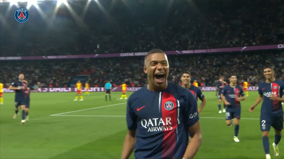 Paris Saint-Germain's Kylian Mbappe celebrates scoring a goal during a Ligue 1 match against RC Lens. [ONE FOOTBALL] 