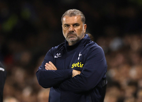 Tottenham Hotspur manager Ange Postecoglou reacts during a Carabao Cup game between Fulham and Tottenham at Craven Cottage in London on Tuesday.  [REUTERS/YONHAP]