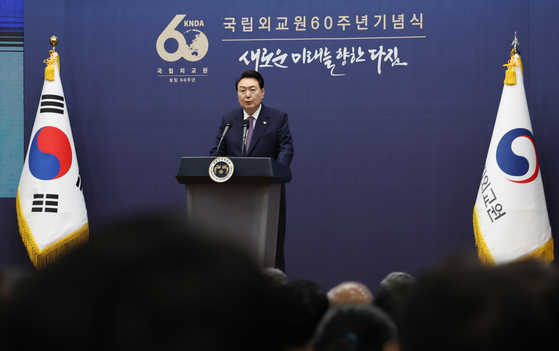 President Yoon Suk Yeol makes a speech at the 60th anniversary of the Korean National Diplomatic Academy ceremony at Seocho-dong, Seoul, on Friday. [YONHAP] 